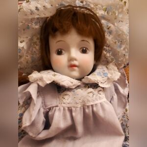 Charming Blue and White Porcelain Doll